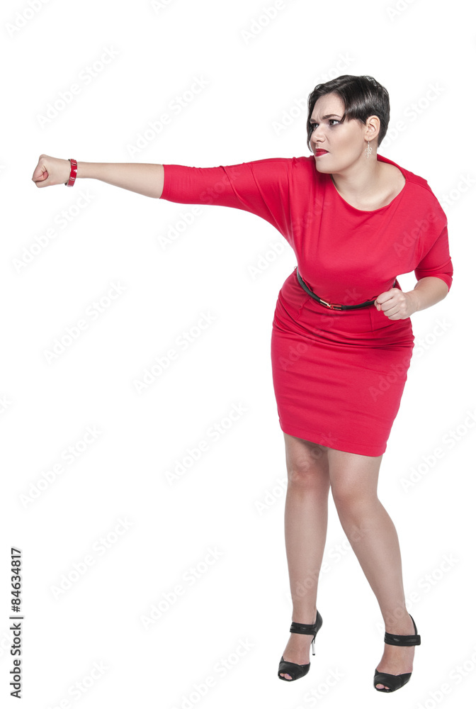 Beautiful plus size woman in red dress beating something isolate Beautiful plus size woman in red dress beating something isolate