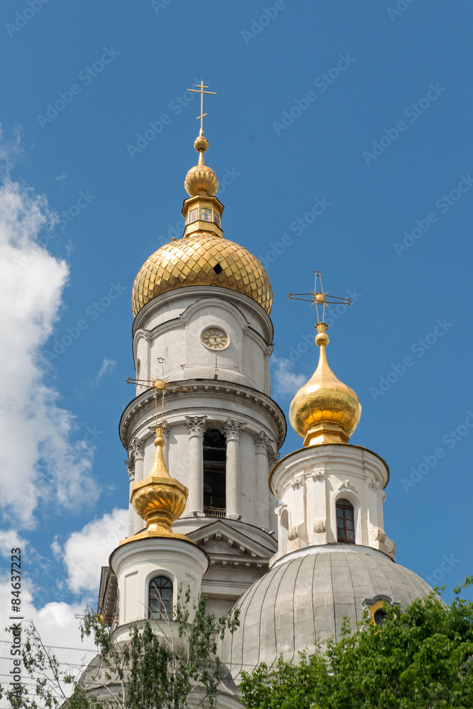 The bell tower of the Assumption Cathedral (1844) in sunny day in Kharkiv, Ukraine