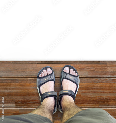  Black sandals on wood