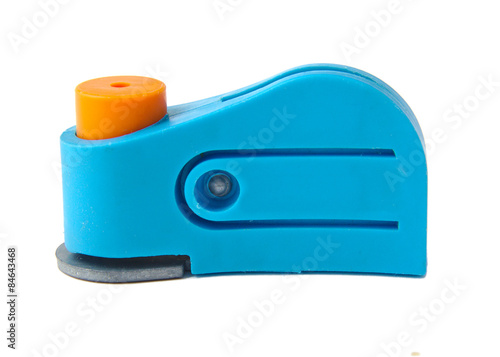 Obraz na plátně Blue plastic hole puncher isolated on a white background