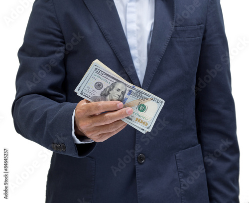 Businessman hands holding us dollar banknote isolated on white