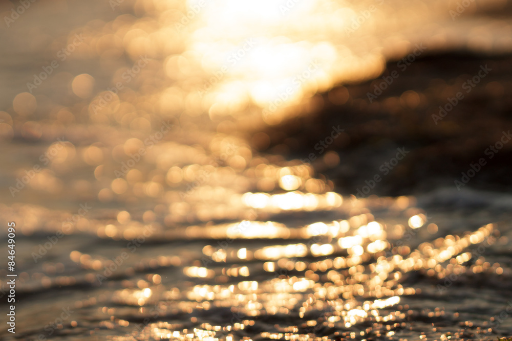 Abstract blurred colorful booked sea water reflecting in the sun Abstract blurred colorful booked sea water reflecting in the sun