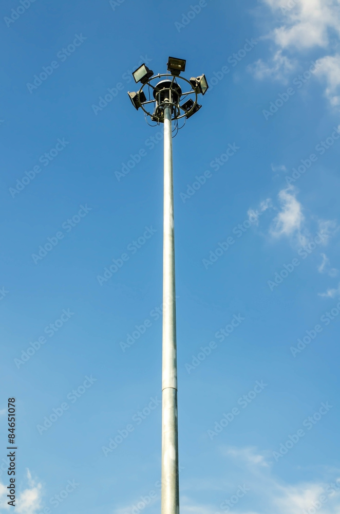 Spot light pole with blue sky