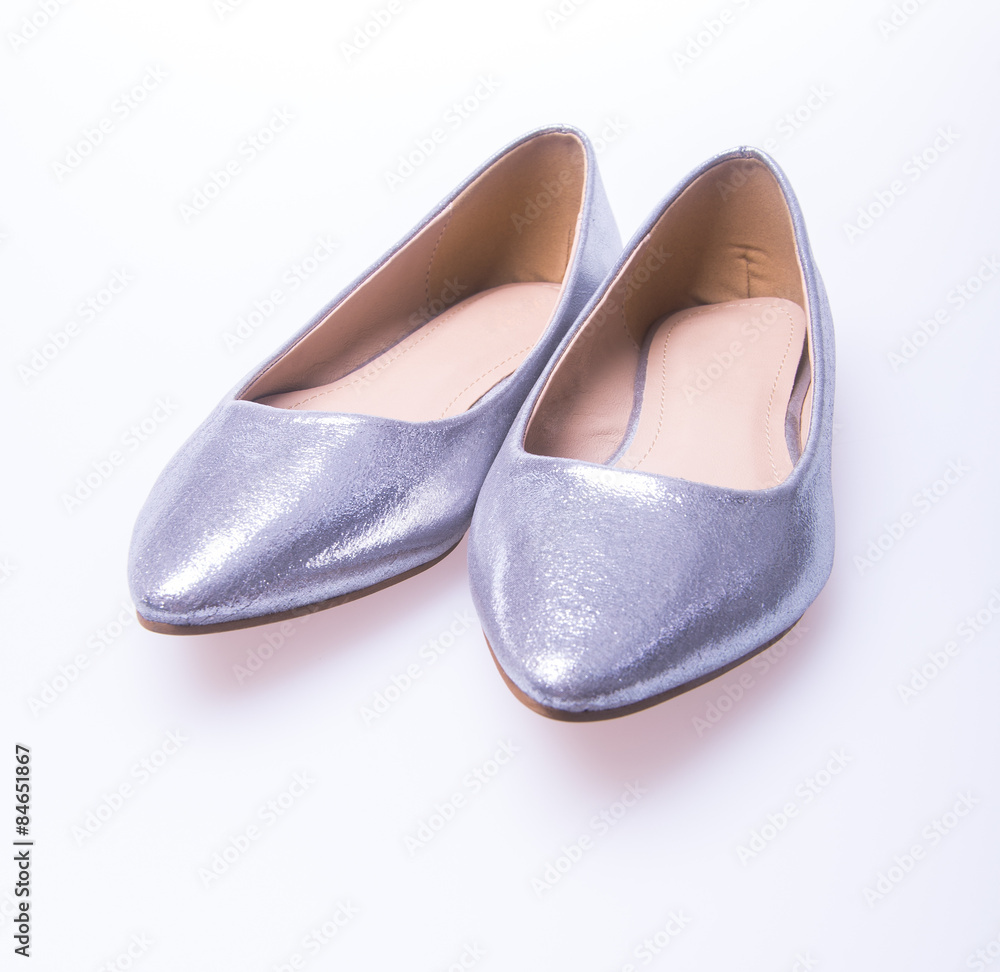 Fototapeta premium shoe. Silver colour fashion woman shoes on a background.