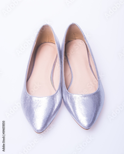 shoe. Silver colour fashion woman shoes on a background.