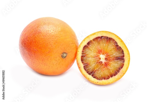 Blood red oranges isolated on white background