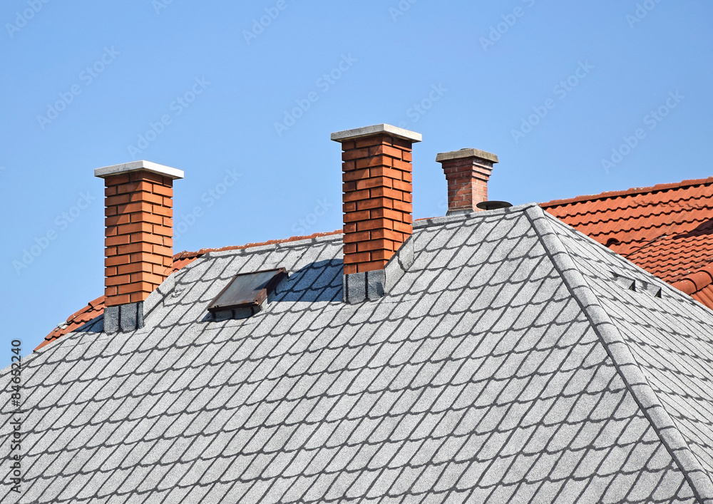 House roof with smoke stacks