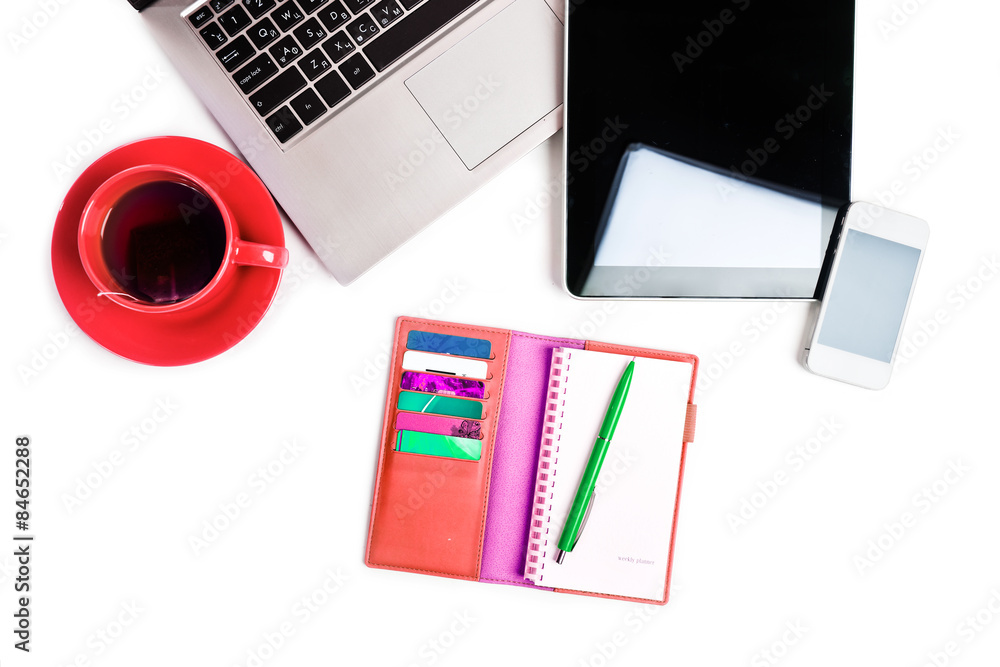 Office desk with laptop computer, tablet pc, planner, pen, mobil Office desk with laptop computer, tablet pc, planner, pen, mobil