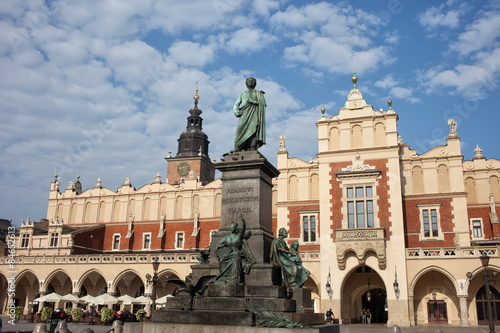 Adam Mickiewicz Monument and Sukiennice in Krakow photo