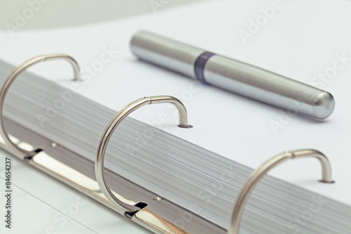 Wallpaper Mural ballpoint pen on notebook. office desktop detail. Torontodigital.ca