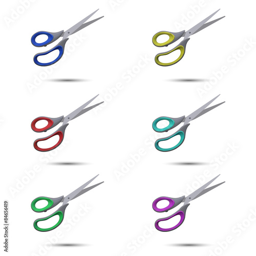 Colored scissors on a white background