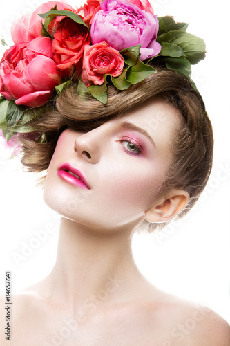 Beautiful lady with a wreath of flowers