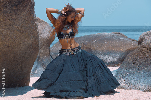 Tribal style woman on the beach