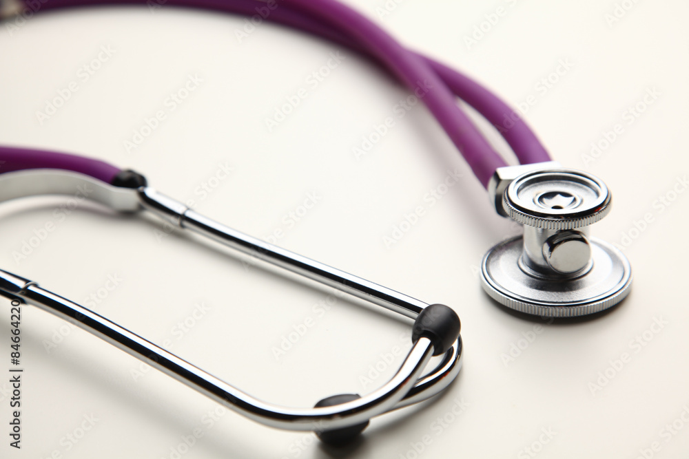 Closeup of a medical stethoscope, isolated on white background Closeup of a medical stethoscope, isolated on white background