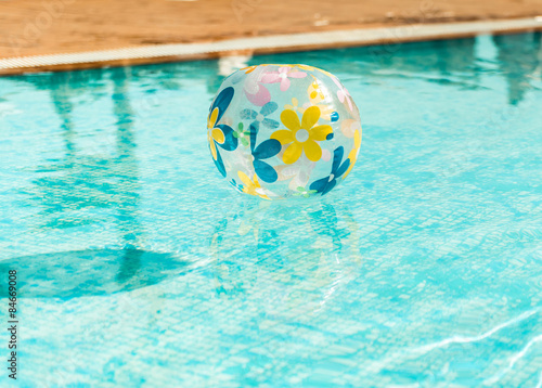 Inflatable ball in the swimming pool