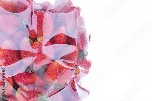 strawberry juicy fruit in plastic bag packaging isolated