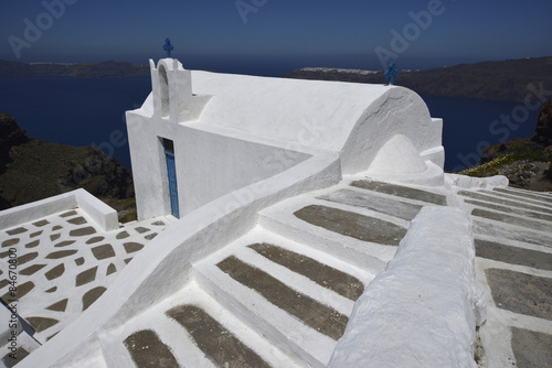 traditional blue and white chapel at Imerovigli, Santorini Greece