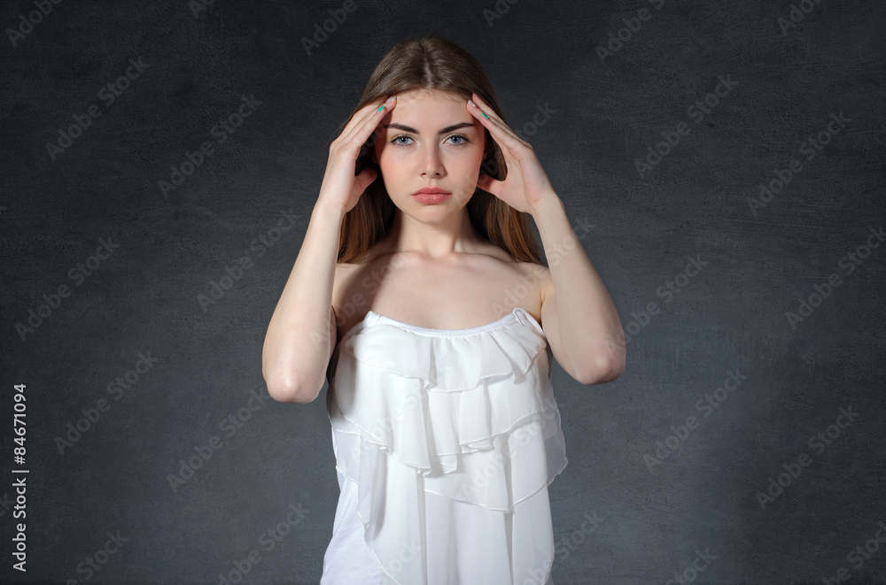 Pain, illness, discomfort concept. Woman put her hands to her te Pain, illness, discomfort concept. Woman put her hands to her te