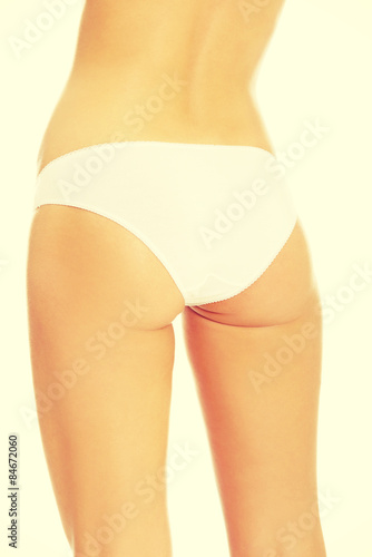 Woman's bum in white panties