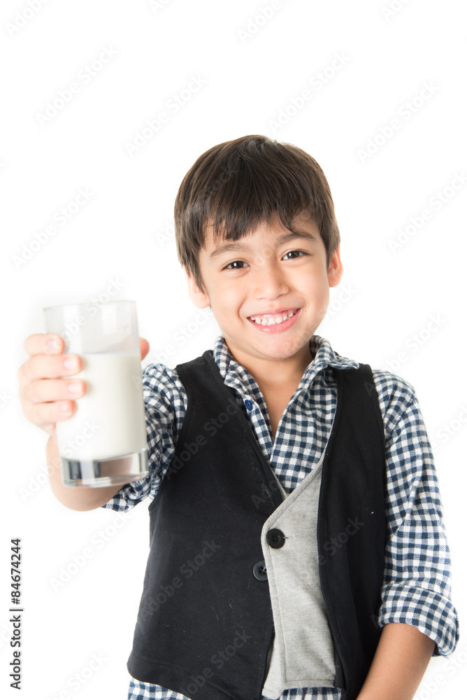 Little boy drinking milk on white background; Little boy drinking milk on white background;