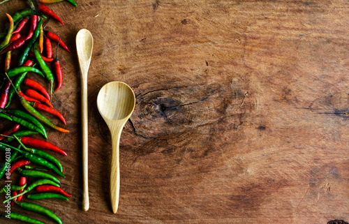 chilli pepper on old wood background