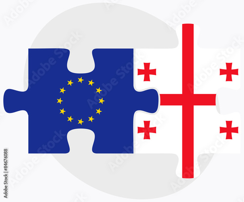 European Union and Georgia Flags in puzzle isolated on white bac