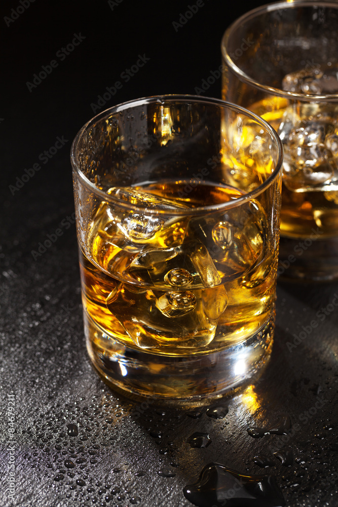 Glasses of scotch whiskey with ice Glasses of scotch whiskey with ice