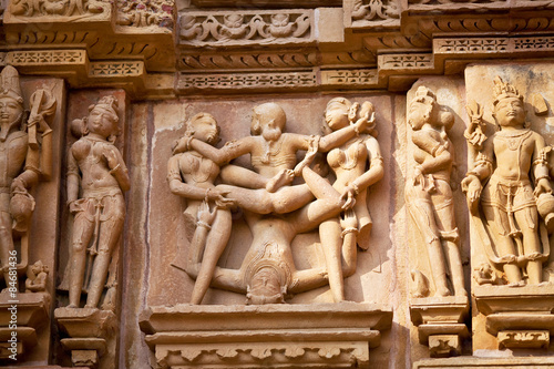 Bas-relief at famous erotic temple in Khajuraho, India