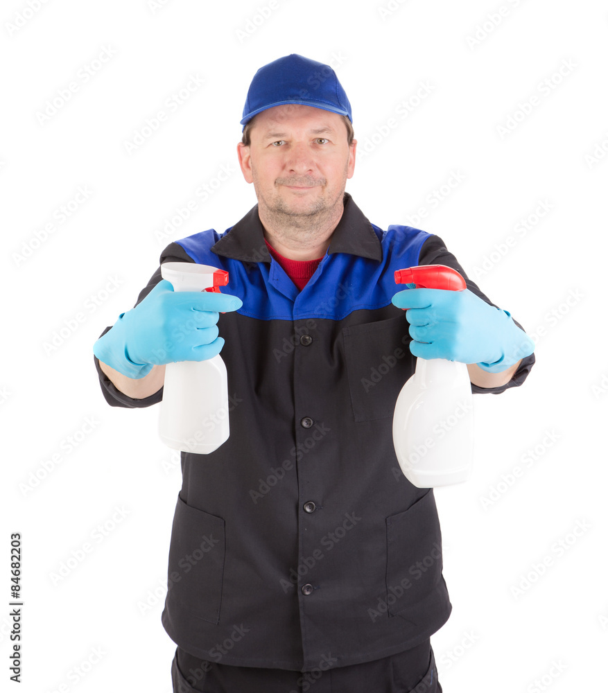 Worker holding spray bottles.