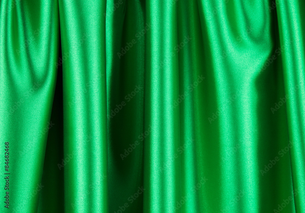 Fototapeta premium Green silk cloth with some folds.