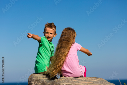 Fototapeta Boy and girl during summer time