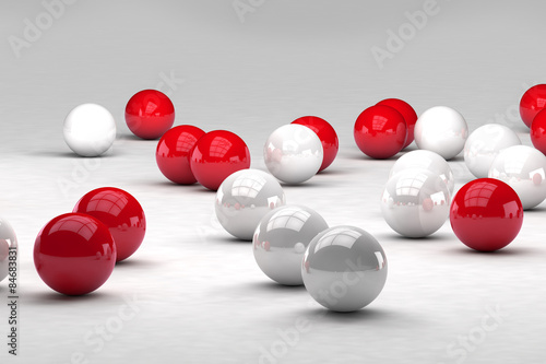 Lots of white and red balls interact. 3D render image.