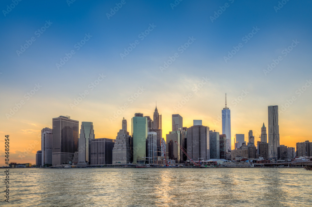 New York City Manhattan downtown skyline at sunset