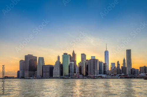 New York City Manhattan downtown skyline at sunset