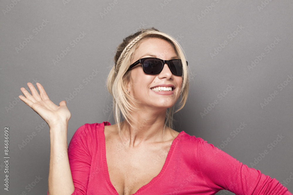 playful 20s girl hiding behind her trendy sunglasses playful 20s girl hiding behind her trendy sunglasses