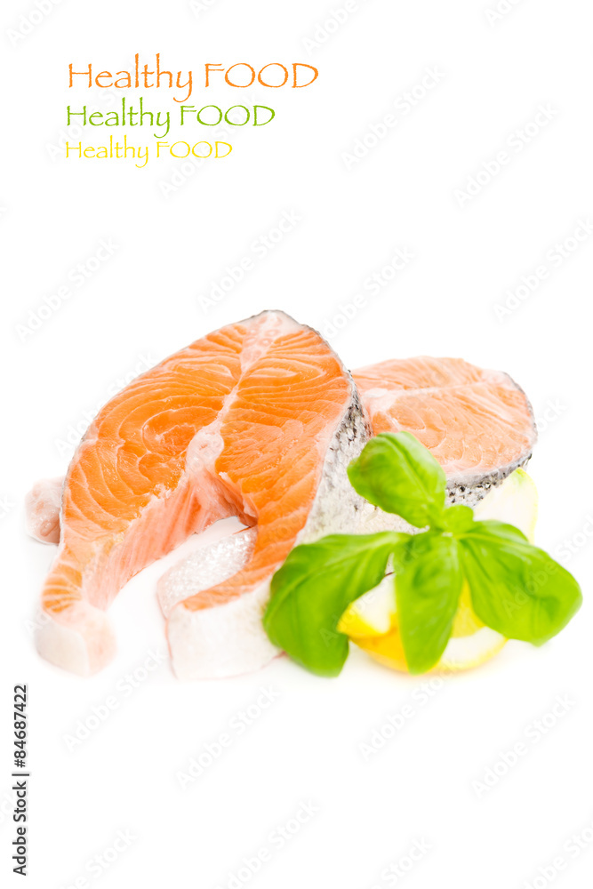 Salmon with basil and lemon isolated copy space Salmon with basil and lemon isolated copy space