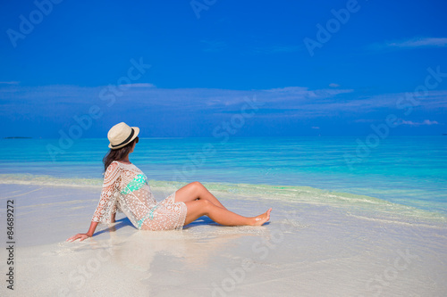 Young woman enjoy tropical beach vacation