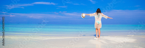 Young woman enjoy tropical beach vacation