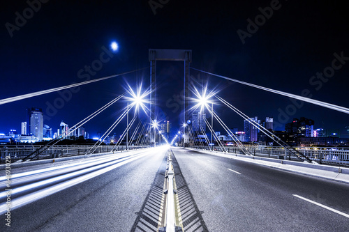 traffic light trail on bridge