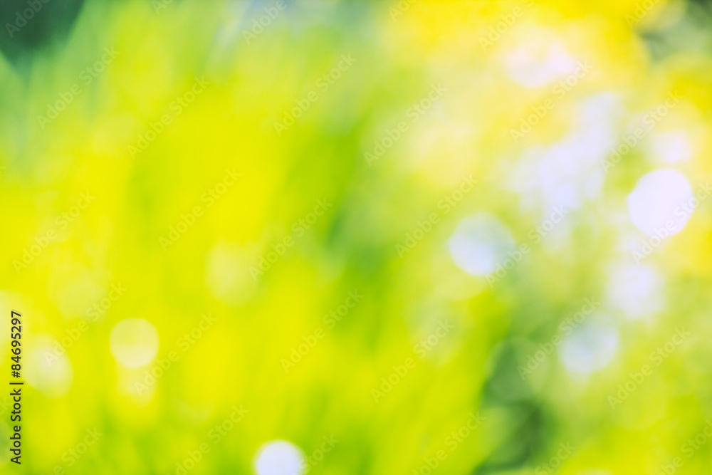 Background with blurred yellow and green spots