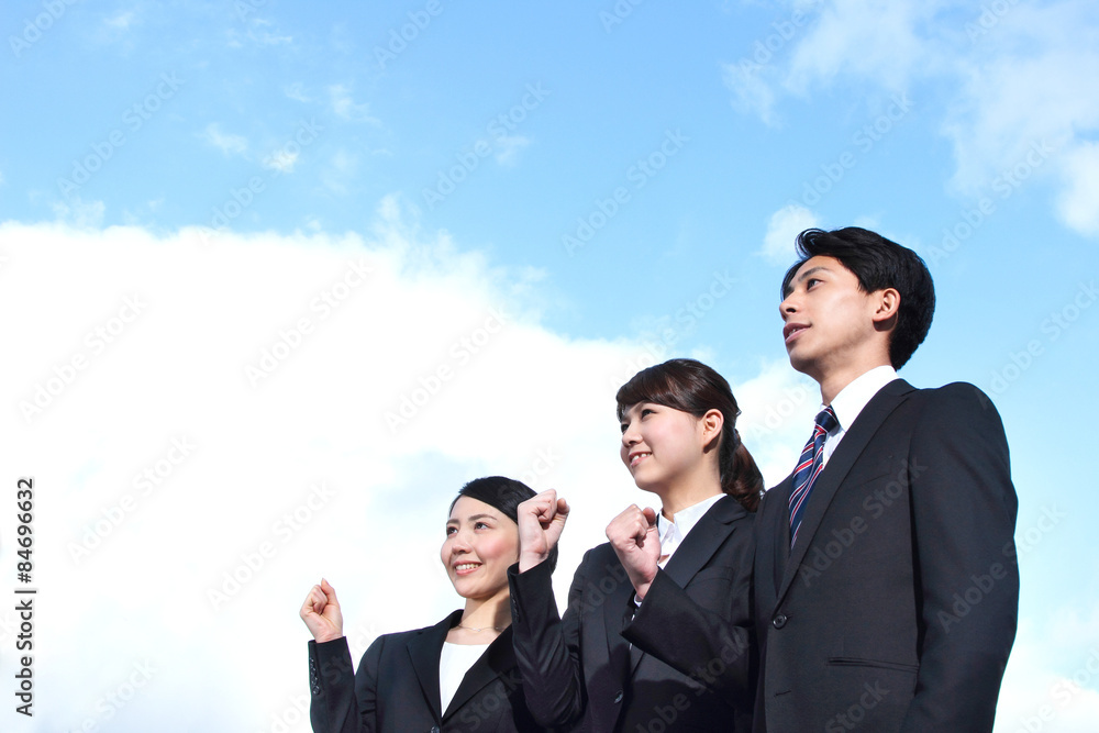 Asian businessman and businesswoman looking up at the sky
Asian businessman and businesswoman looking up at the sky