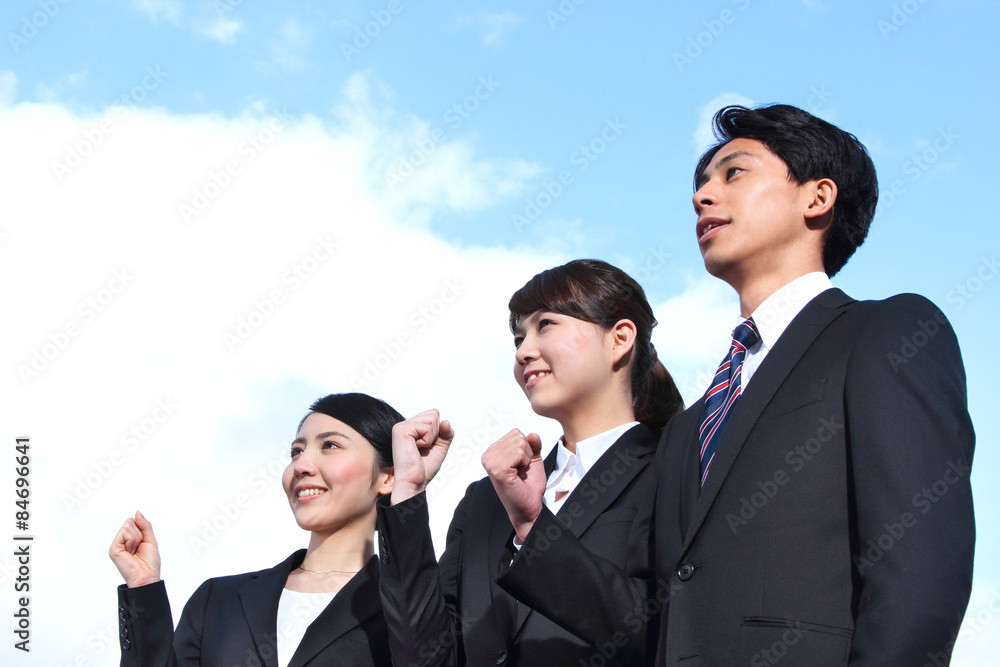Asian businessman and businesswoman looking up at the sky
Asian businessman and businesswoman looking up at the sky