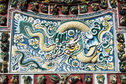 Traditional chinese style on temple wall in Thailand