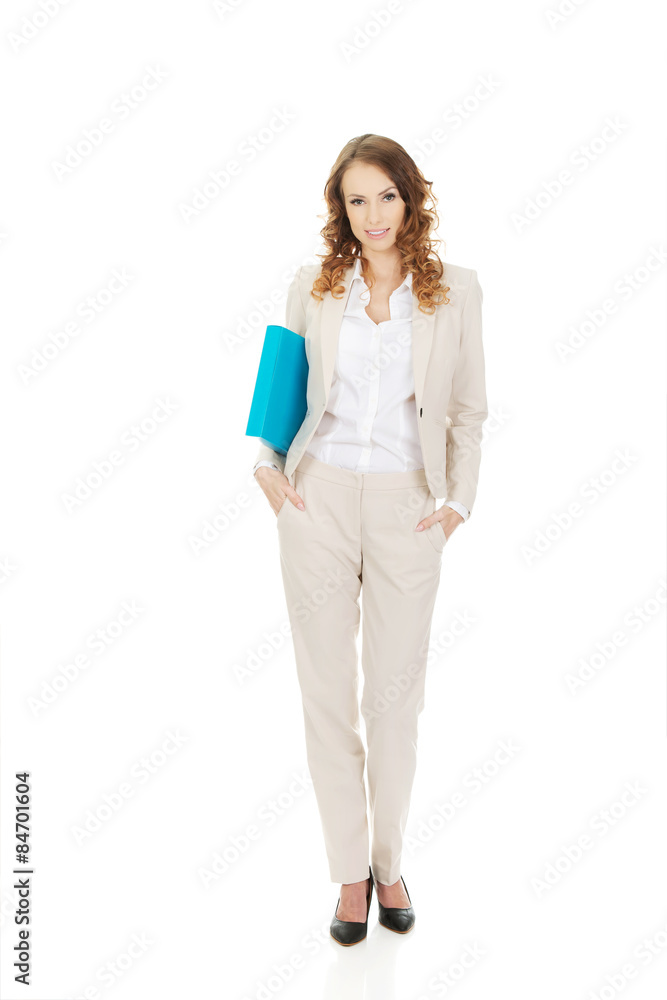 Happy businesswoman with binder. Happy businesswoman with binder.