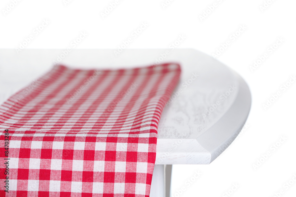 Wooden table with napkin isolated on white Wooden table with napkin isolated on white