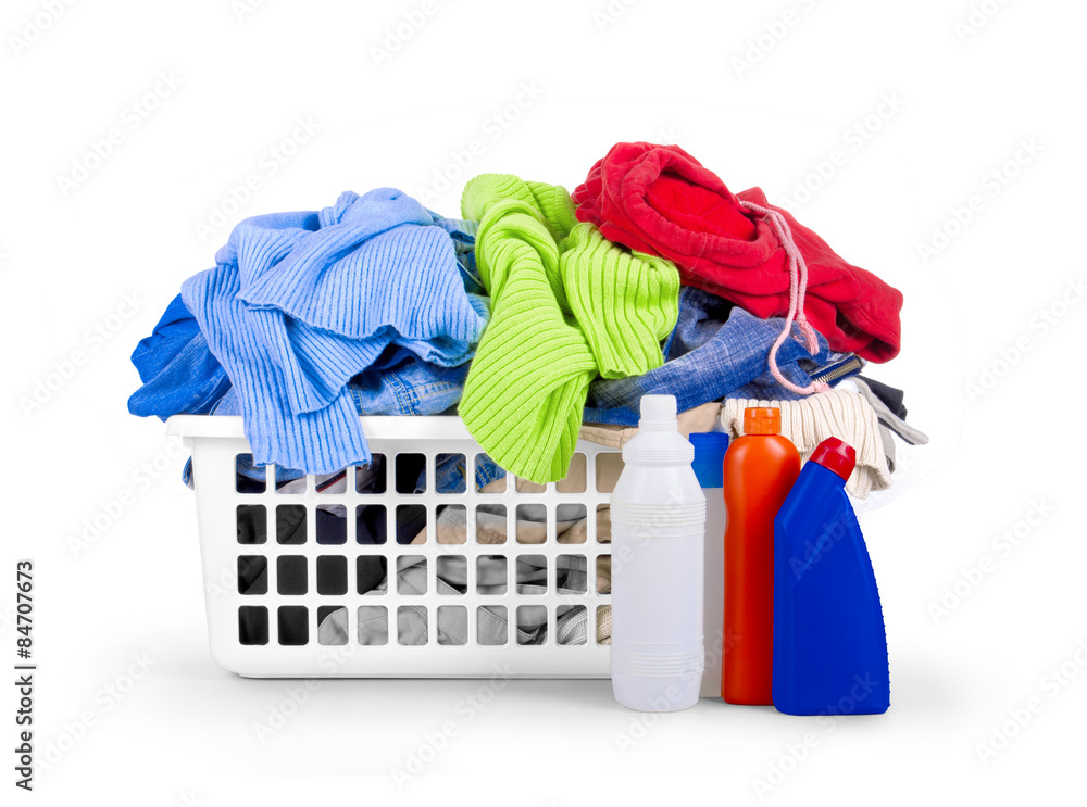 Clothes with detergent and in plastic basket dropped isolated o Clothes with detergent and in plastic basket dropped isolated o