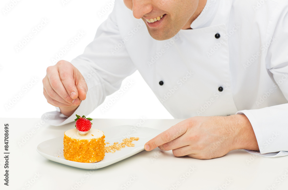 close up of male chef cook decorating dessert close up of male chef cook decorating dessert