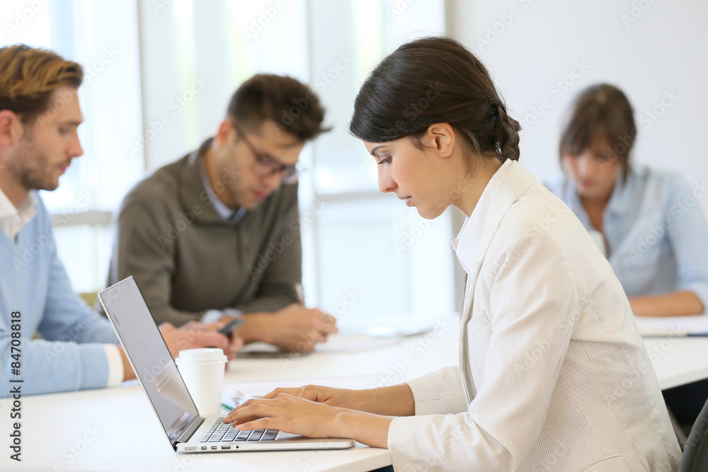 Start-up businesspeople sharing working space Start-up businesspeople sharing working space