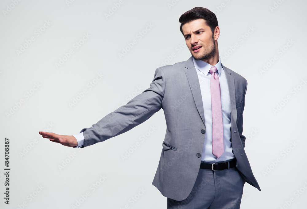 Businessman showing stop gesture Businessman showing stop gesture
