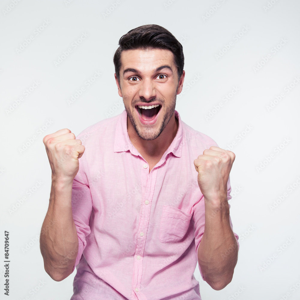 Happy businessman celebrating his success Happy businessman celebrating his success